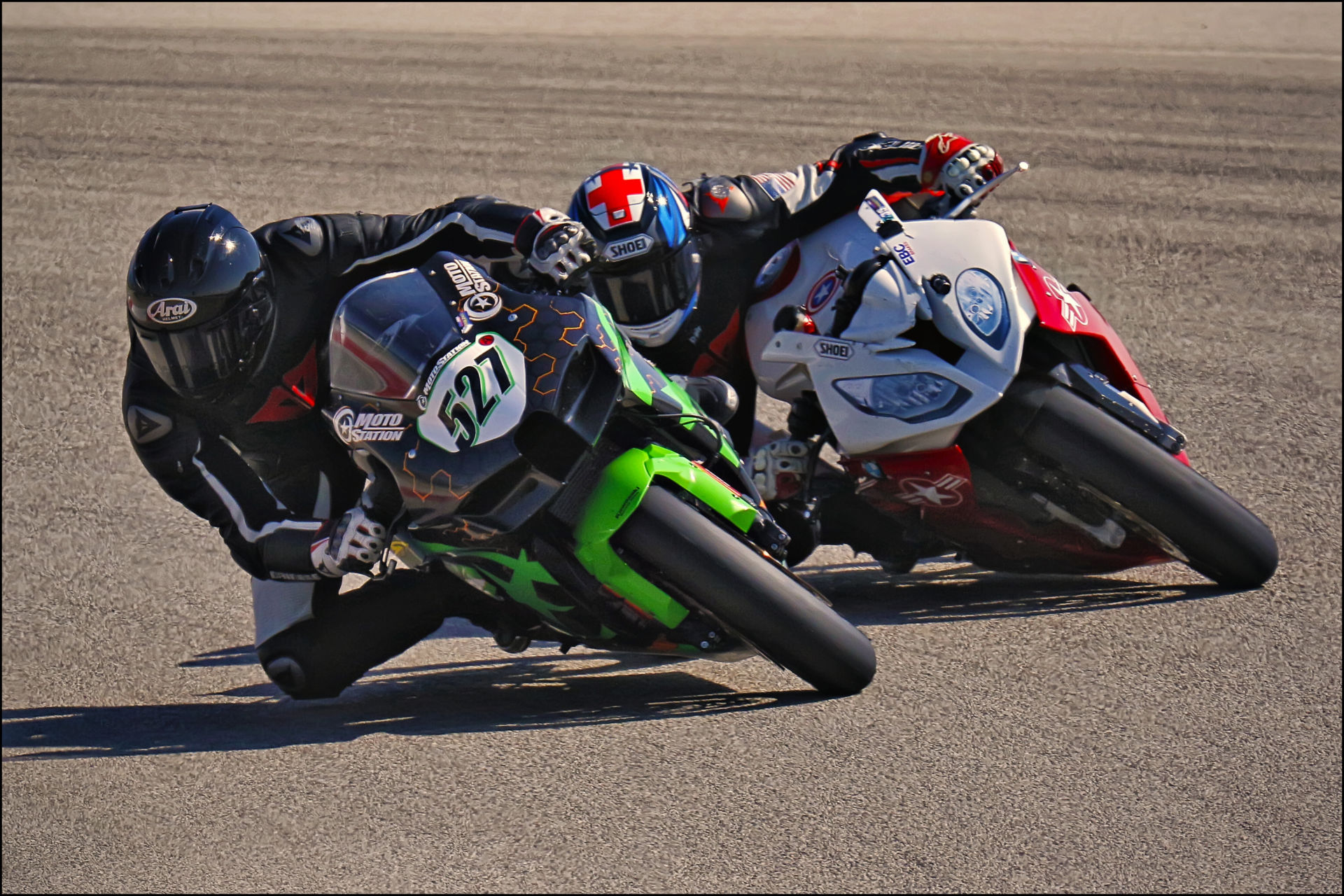 Jerry Hicks (527) fends off Bill Davis (53) during Round 5 of UtahSBA’s King of the Mountain Race held at Utah Motorsports Campus’ Perimeter Track. Photo by Steve Midgley, Courtesy UtahSBA.