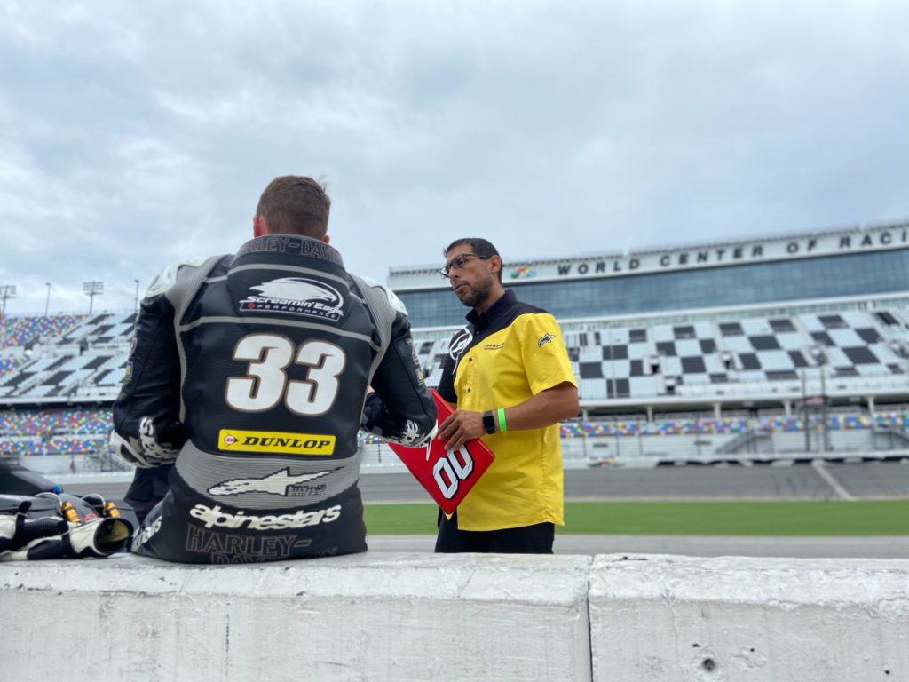 Kyle Wyman (left) working with Dunlop tire engineer Tony Romo (right) on pit lane at Daytona International Speedway. Photo courtesy Kyle Wyman.