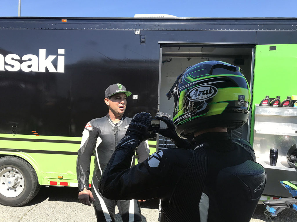 Kawasaki's Media Relations Supervisor Brad Puetz (right) shoots a short video of Jeremy McGrath. The seven-time AMA 250cc Supercross Champion joined the Kawasaki crew and rode a ZX-10R for the day. Photo by Michael Gougis.