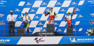 Hungarian-American Rossi Moor (center) on top of the Northern Talent Cup podium at Red Bull Ring. Moor is flanked by runner-up Lenoxx Phommara (left), third-place finisher Kevin Farkas (right), and Dorna CEO Carmelo Ezpeleta (far left). Photo courtesy Dorna.