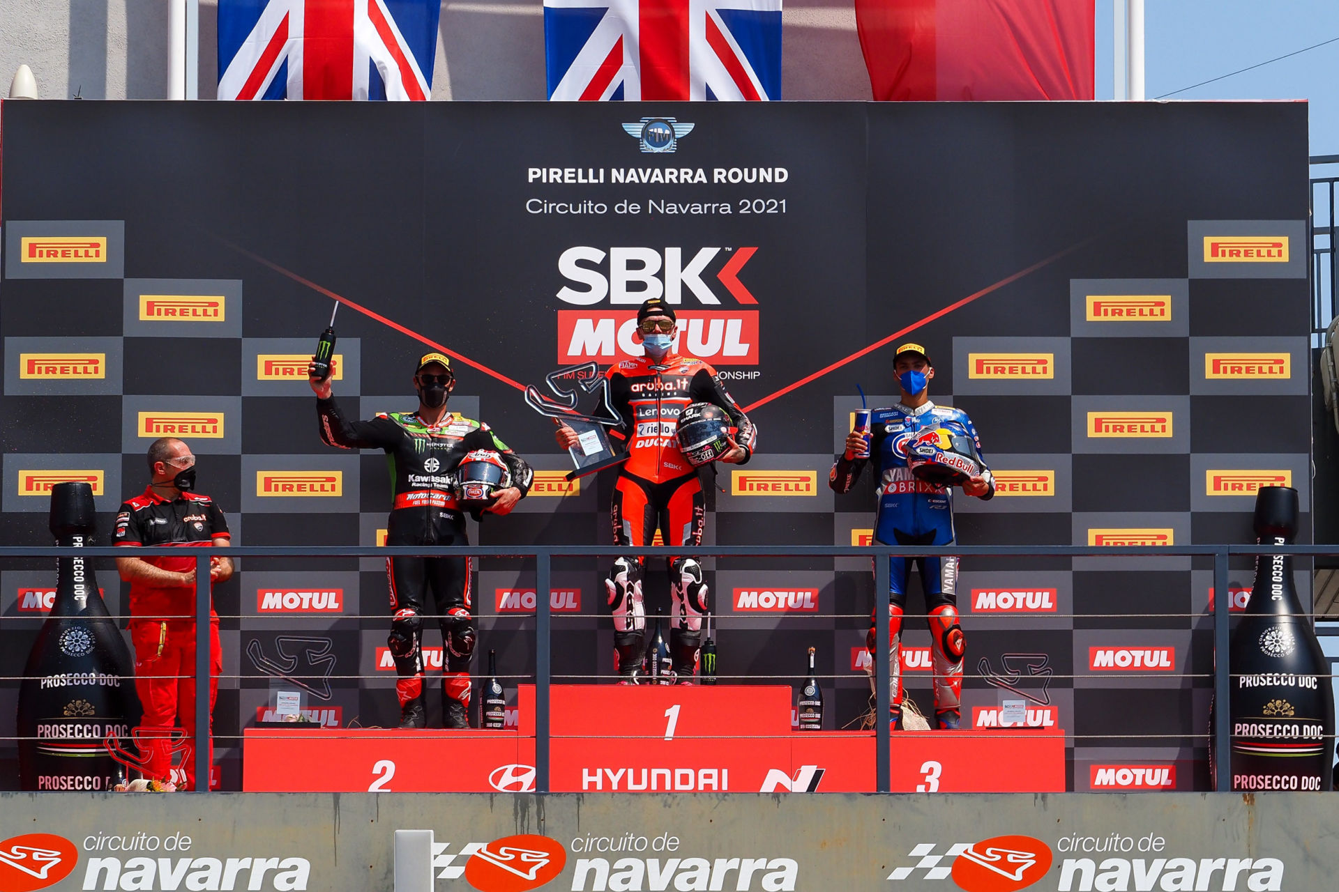 Race One winner Scott Redding (center), runner-up Jonathan Rea (left), and third-place finisher Toprak Razgatlioglu (right) on the podium at Navarra. Photo courtesy Dorna.