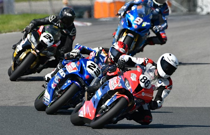 Ben Young (86) held off championship leader Alex Dumas (23) in a thrilling race-long battle at CTMP. Photo by Damian Pereira, courtesy CSBK.