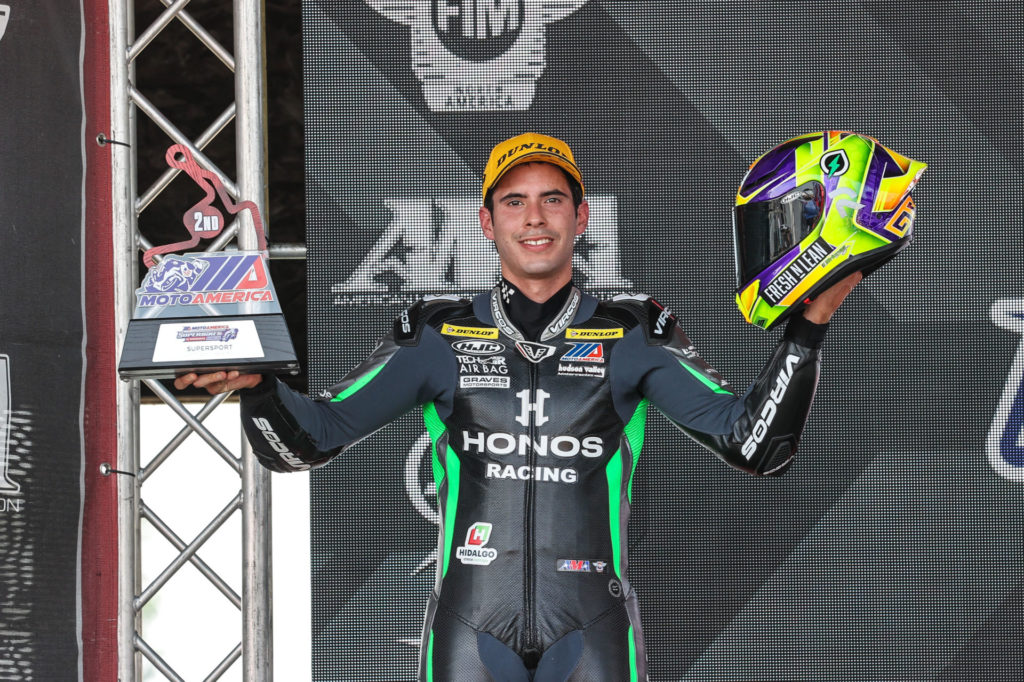 Richie Escalante on the MotoAmerica Supersport podium at Brainerd. Photo by Brian J. Nelson, courtesy HONOS HVMC Racing.