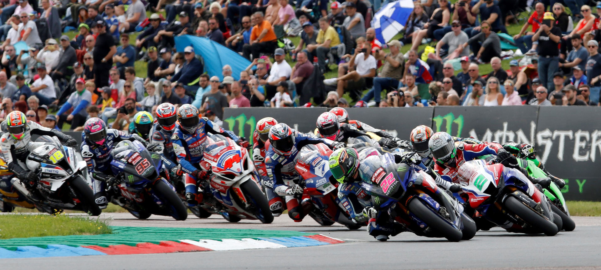 Jason O'Halloran (22) leads a British Superbike race start Sunday at Thruxton Circuit. Photo courtesy MotorSport Vision Racing.