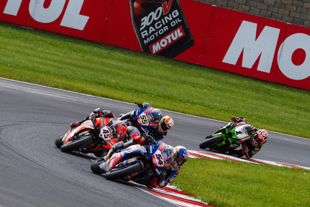 Toprak Razgatlioglu (54) leads Scott Redding (45), Andrea Locatelli (55), and Jonathan Rea (1) during Race Two. Photo courtesy Dorna.