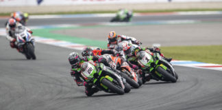 Alex Lowes (22) leads Scott Redding (behind Lowes), Jonathan Rea (1), Michael van der Mark (behind Rea), and the rest of the World Superbike field at Assen. Photo courtesy Kawasaki.