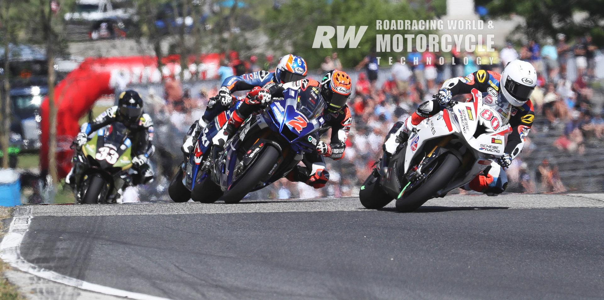 Hector Barbera (80) leads Josh Herrin (2), Cam Petersen, and Kyle Wyman (33) in Superbike Race Two at Road America. Photo by Brian J. Nelson.