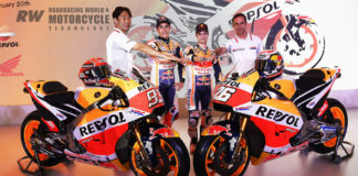Team Manager Alberto Puig (right) is shown at the 2018 Repsol Honda MotoGP team presentation, with (from left) HRC's Tetshiro Kuwata, Marc Marquez, and Dani Pedrosa. Photo by DPPI.