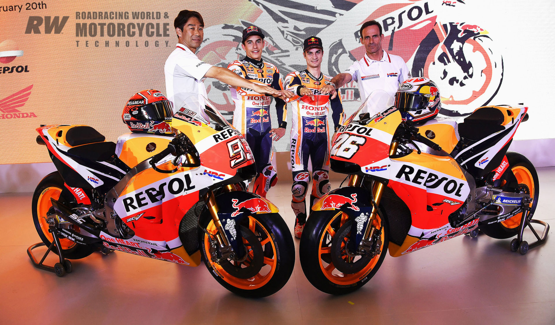 Team Manager Alberto Puig (right) is shown at the 2018 Repsol Honda MotoGP team presentation, with (from left) HRC's Tetshiro Kuwata, Marc Marquez, and Dani Pedrosa. Photo by DPPI.