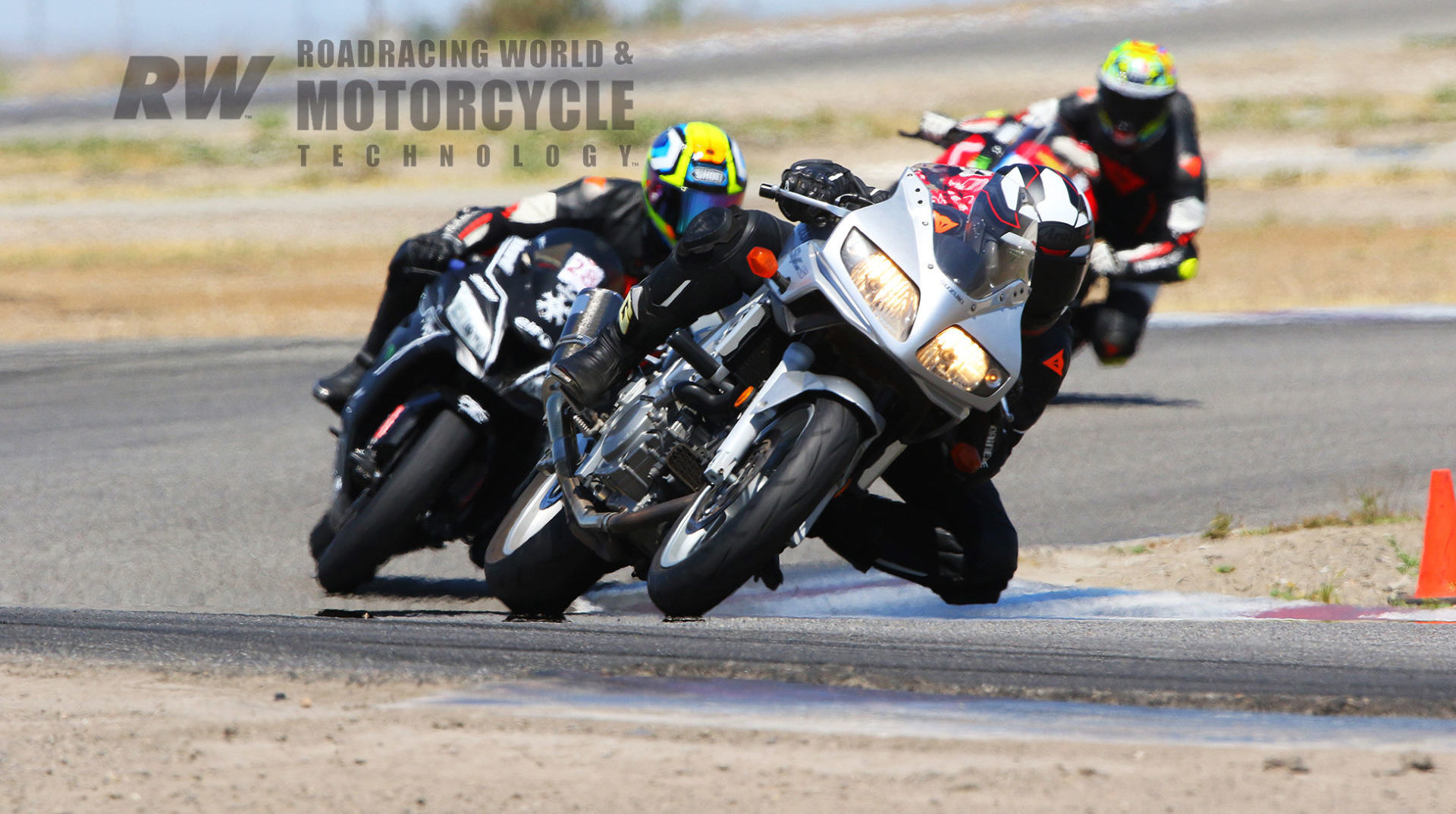 The author in action at Buttonwillow on his 2003 Suzuki SV650 after fitting a Traxxion Dynamics AR-25 Axxion Rod Damper Kit. The kit improved feel, compliance, and control. Photo by Caliphotography.com.