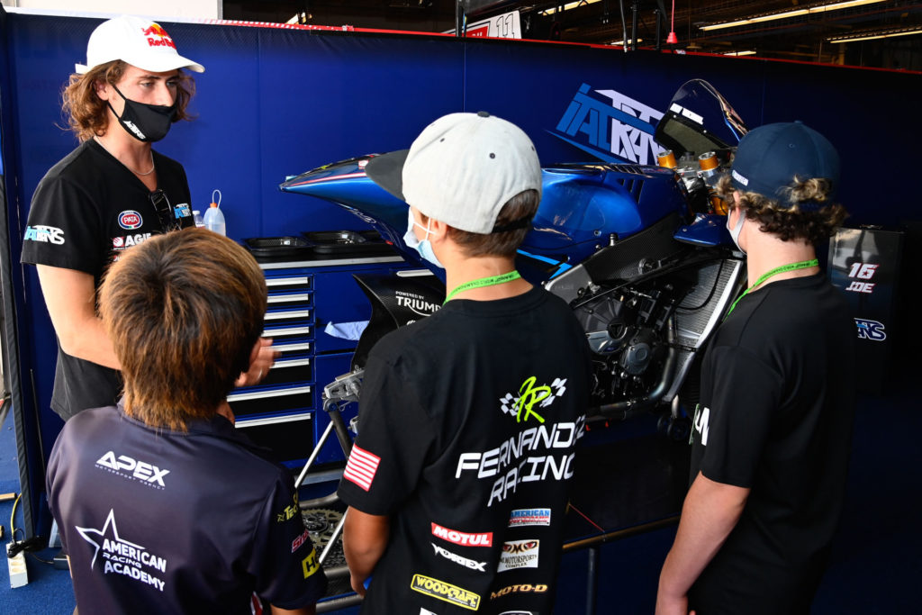 American Moto2 racer and MiniGP World Series ambassador Joe Roberts (far left) with FIM MiniGP North America stars (continuing from left) Kensei Matsudaira, Jayden Fernandez, and Jesse James Shedden in the Italtrans Racing garage at COTA. Photo courtesy Dorna.