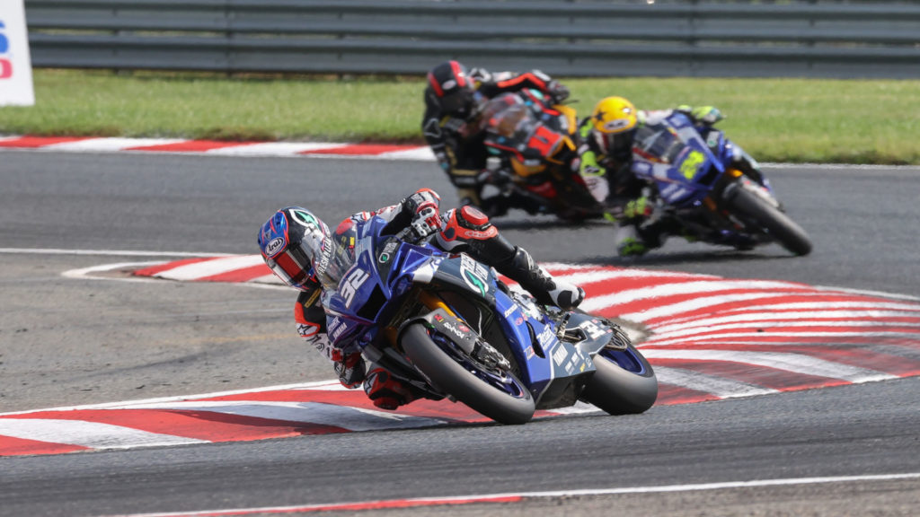 Jake Gagne (32) leads Toni Elias (24) and Mathew Scholtz (11) early in Race One. Photo courtesy Yamaha.