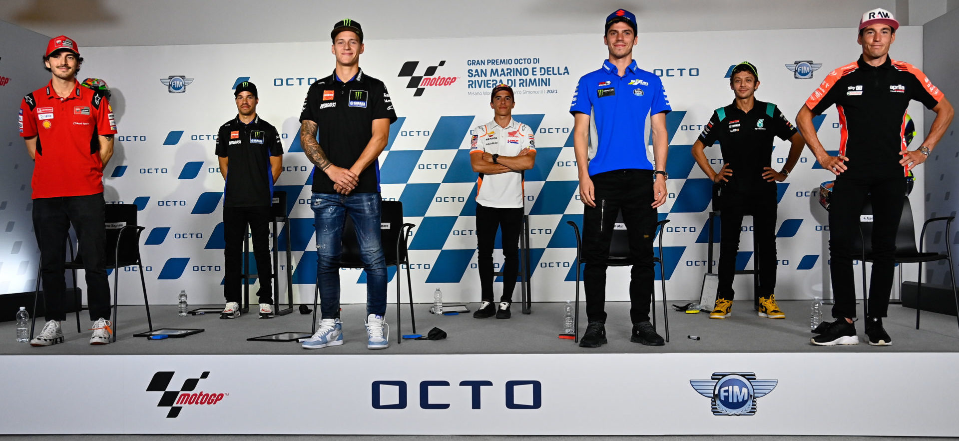 MotoGP riders (from left) Francesco Bagnaia, Franco Morbidelli, Fabio Quartararo, Marc Marquez, Joan Mir, Valentino Rossi, and Aleix Espargaro at the pre-event press conference at Catalunya. Photo courtesy Dorna.