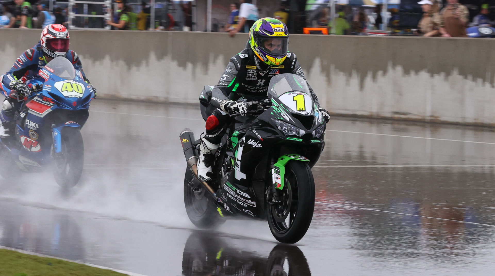 Richie Escalante (1) leading Sean Dylan Kelly (40) during wet MotoAmerica Supersport Race One at Barber Motorsports Park. Photo by Brian J. Nelson.