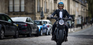 A well dressed participant on a Triumph motorcycle during a Distinguished Gentleman's Ride in England. Photo courtesy Triumph.