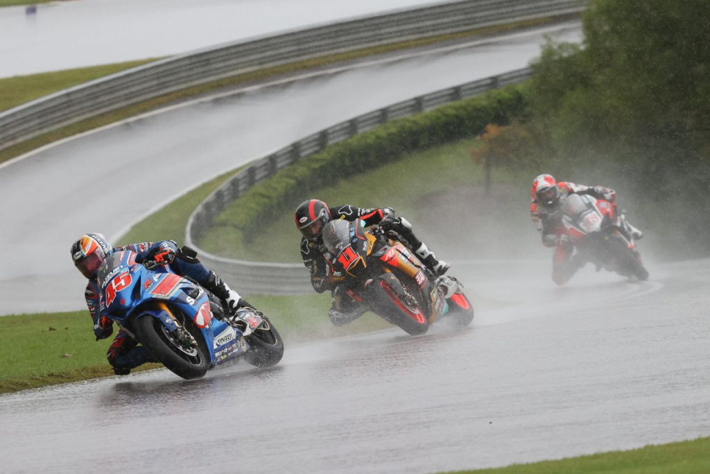 Cameron Petersen (45) leads Mathew Scholtz (11) and Loris Baz (76) during rainy Race One at Barber Motorsports Park. Photo by Brian J. Nelson, courtesy MotoAmerica.