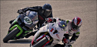Genaro Lopez (122) fends off Jerry Hicks (527) in the final corner during Round 6 of the UtahSBA’s King of the Mountain Race held at Utah Motorsports Campus’ East Track. Photo by Steve Midgley, courtesy UtahSBA.
