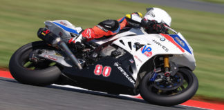 Hector Barbera (80) at speed on his Aftercare BMW S1000RR Superbike. Photo by Brian J. Nelson, courtesy Scheibe Racing.