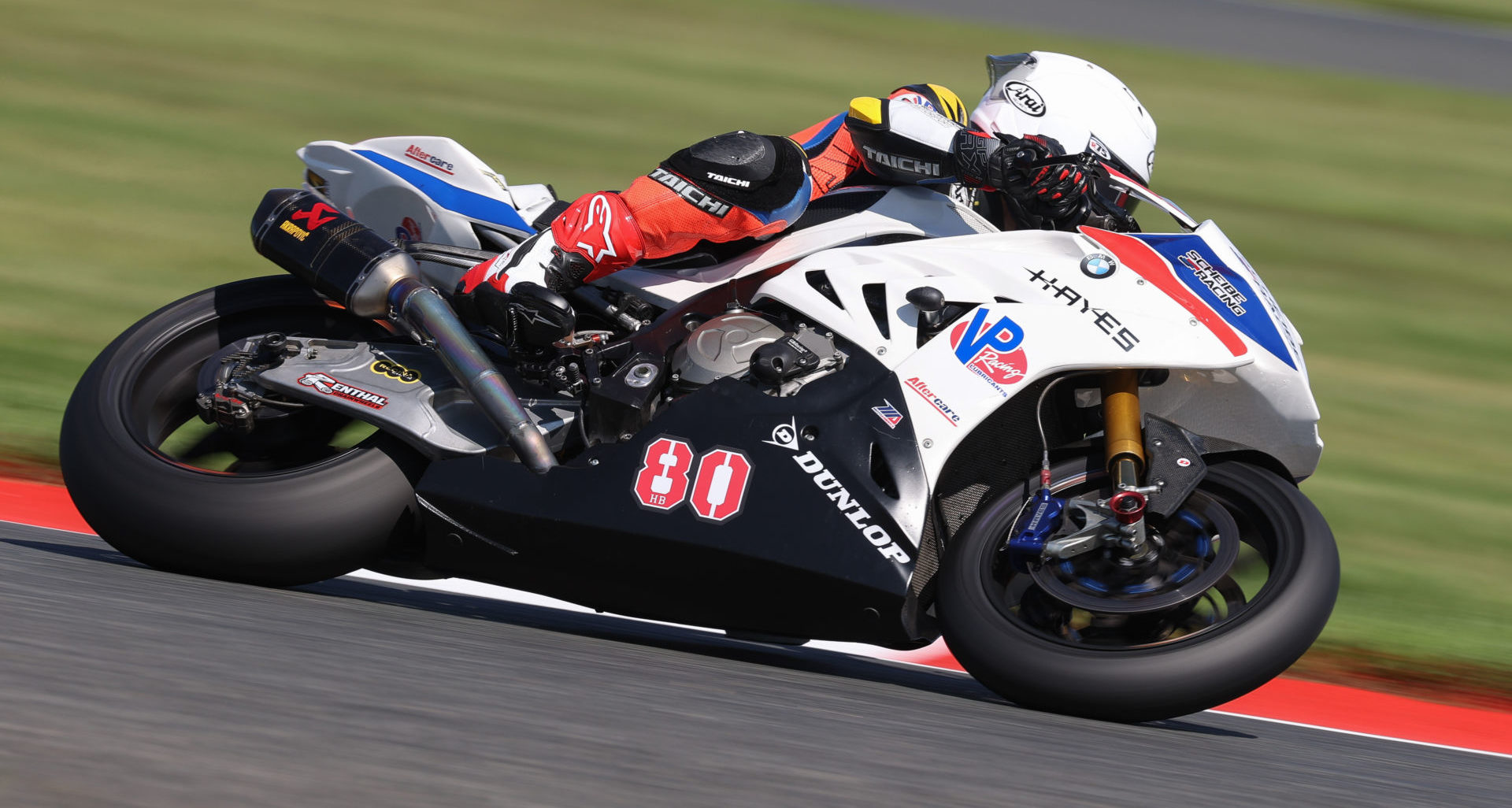 Hector Barbera (80) at speed on his Aftercare BMW S1000RR Superbike. Photo by Brian J. Nelson, courtesy Scheibe Racing.