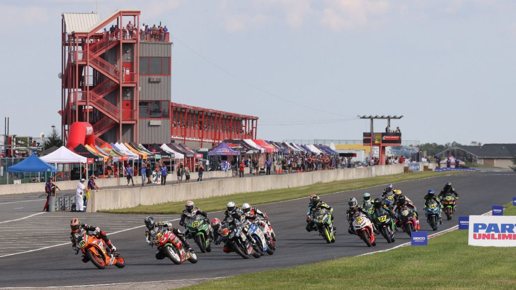 Tyler Scott (70) leads the start of Junior Cup Race One at NJMP. Photo by Brian J. Nelson, courtesy MotoAmerica.