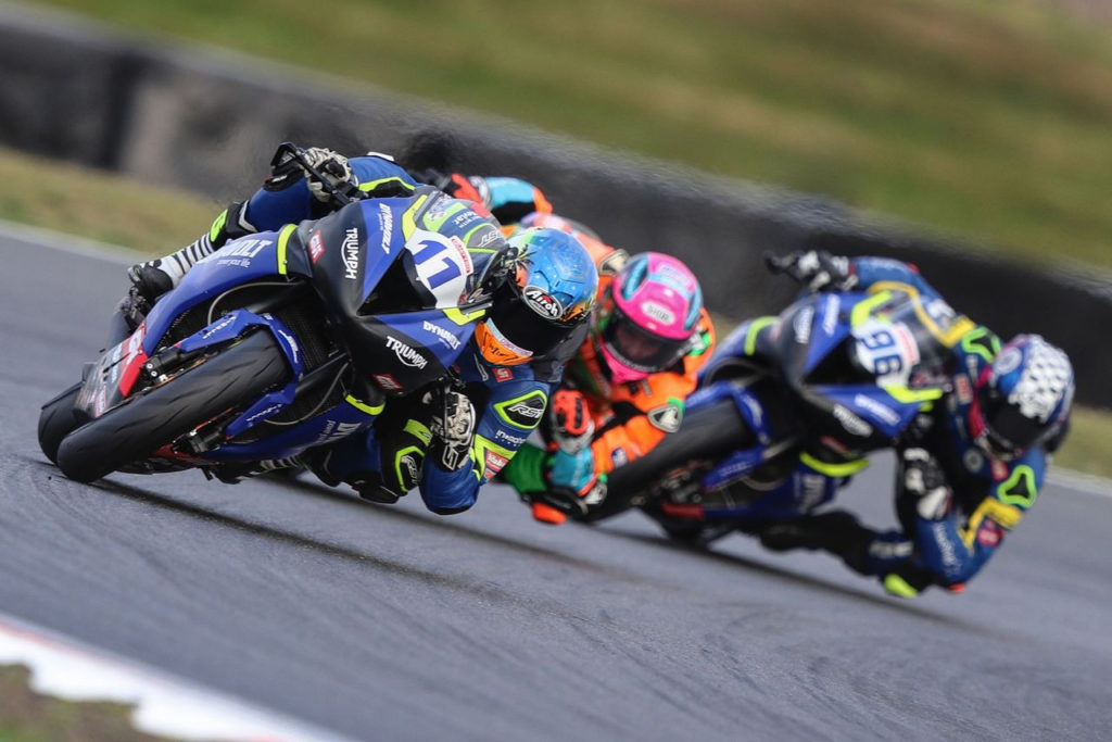 Kyle Smith (11) and Brandon Paasch (96) at speed during British Supersport Race One at Snetterton. Photo courtesy Dynavolt Triumph.