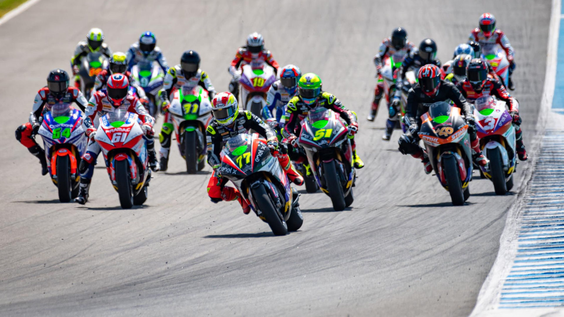 Dominique Aegerter (77) leads the MotoE World Cup field into a turn. Photo courtesy Dorna.