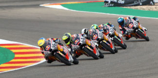 Daniel Holgado (96) leads Daniel Munoz (64), David Alonso (80), Diego Moreira (92), and Matteo Bertelle (28) during Red Bull MotoGP Rookies Cup Race One at Motorland Aragon. Photo courtesy Red Bull.