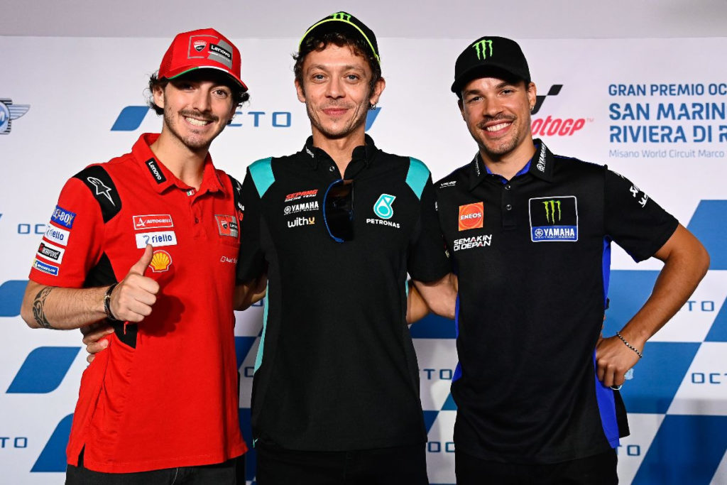 Valentino Rossi (center) with VR46 Academy graduates Francesco Bagnaia (left) and Franco Morbidelli (right). Photo courtesy Dorna.