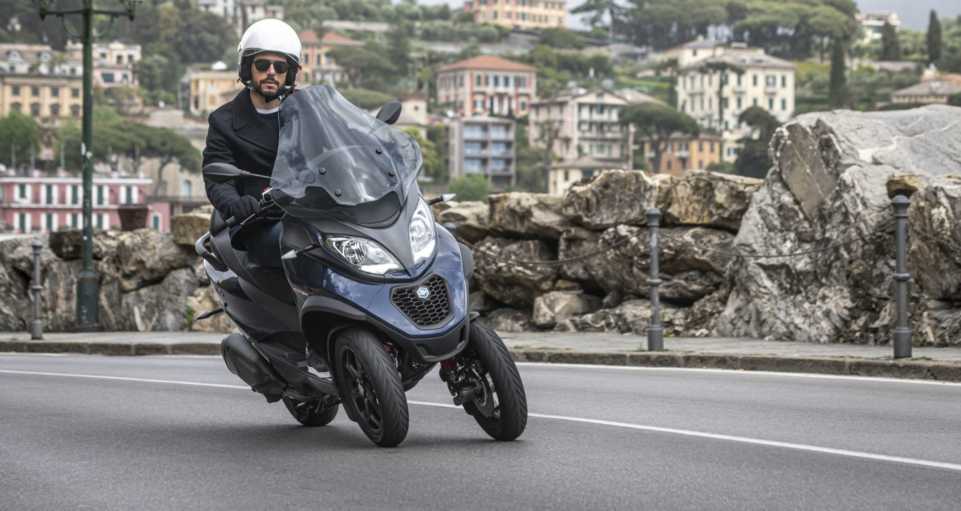 A Piaggio MP3 three-wheel scooter, which has a patented front wheel tilting system. Photo courtesy Piaggio Group.