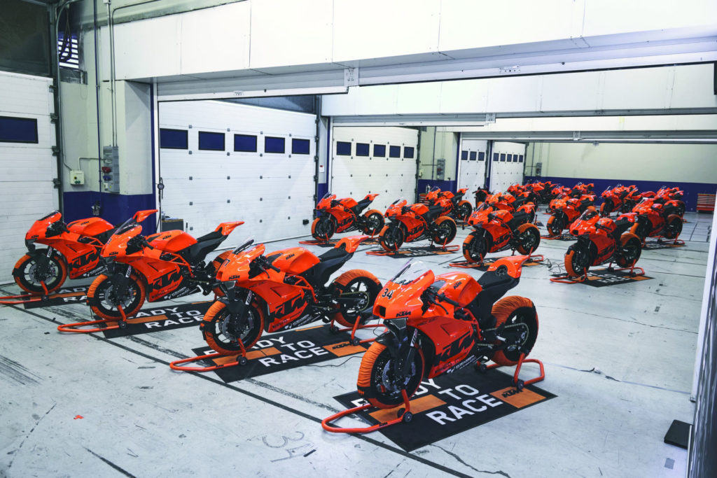 KTM RC 8C track-only motorcycles await their new owners in garages at Jerez. Photo by @francescmonterophoto, courtesy KTM.