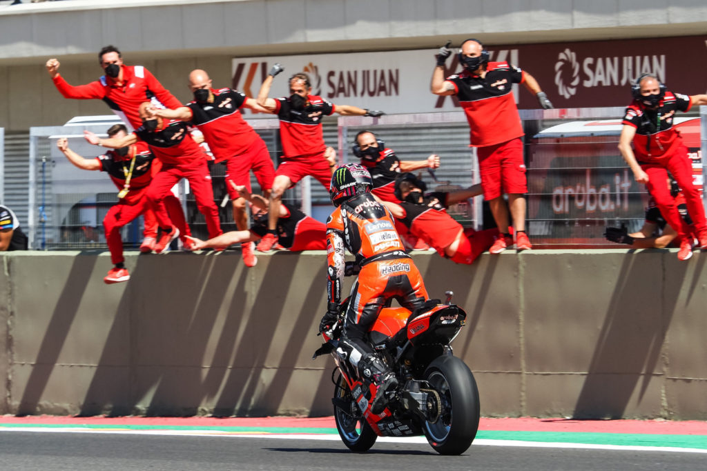 Scott Redding is greeted by his team at the finish of Race Two. Photo courtesy Dorna.