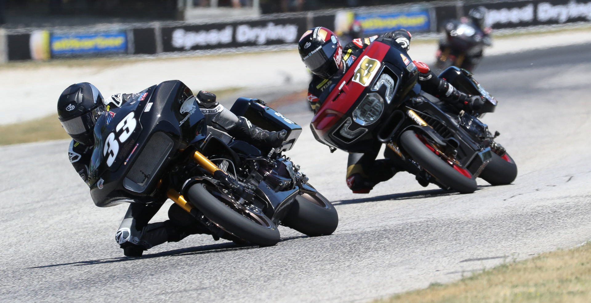 Kyle Wyman (33) and Tyler O'Hara (29) racing for the lead of the King Of The Baggers race at Road America in 2021. Photo by Brian J. Nelson.