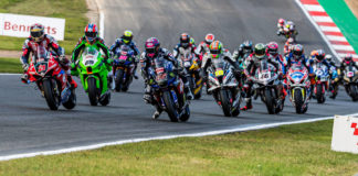 Tarran Mackenzie (95) and Christian Iddon (21) battle for the lead early in British Superbike Race One at Brands Hatch. Photo by Barry Clay.