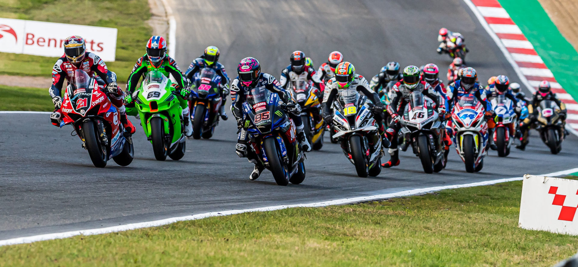 Tarran Mackenzie (95) and Christian Iddon (21) battle for the lead early in British Superbike Race One at Brands Hatch. Photo by Barry Clay.