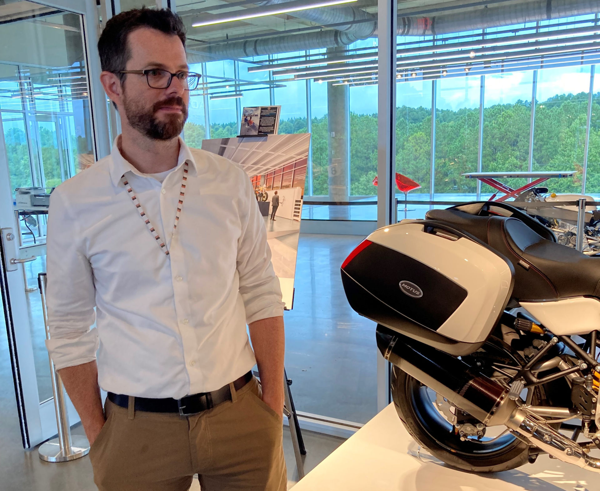 Brian Case, Director of the BADC, in front of a Motus MST V4 at the Barber Vintage Motorsports Museum. Photo by John Ulrich.