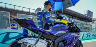 Dominique Aegerter on the grid with his Ten Kate Racing Yamaha and his Chicken Hawk Racing tire warmers. Photo courtesy Chicken Hawk Racing.