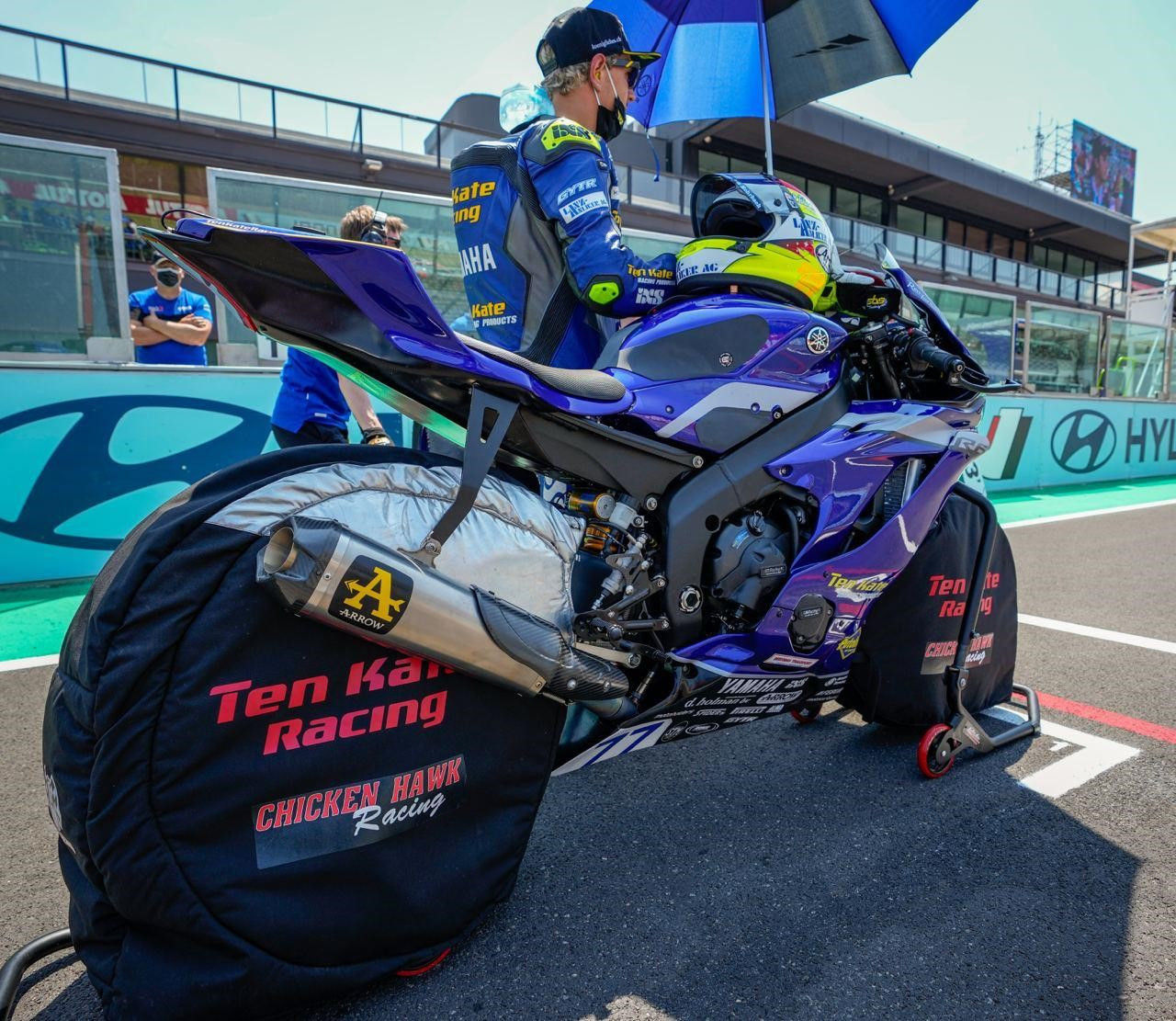Dominique Aegerter on the grid with his Ten Kate Racing Yamaha and his Chicken Hawk Racing tire warmers. Photo courtesy Chicken Hawk Racing.