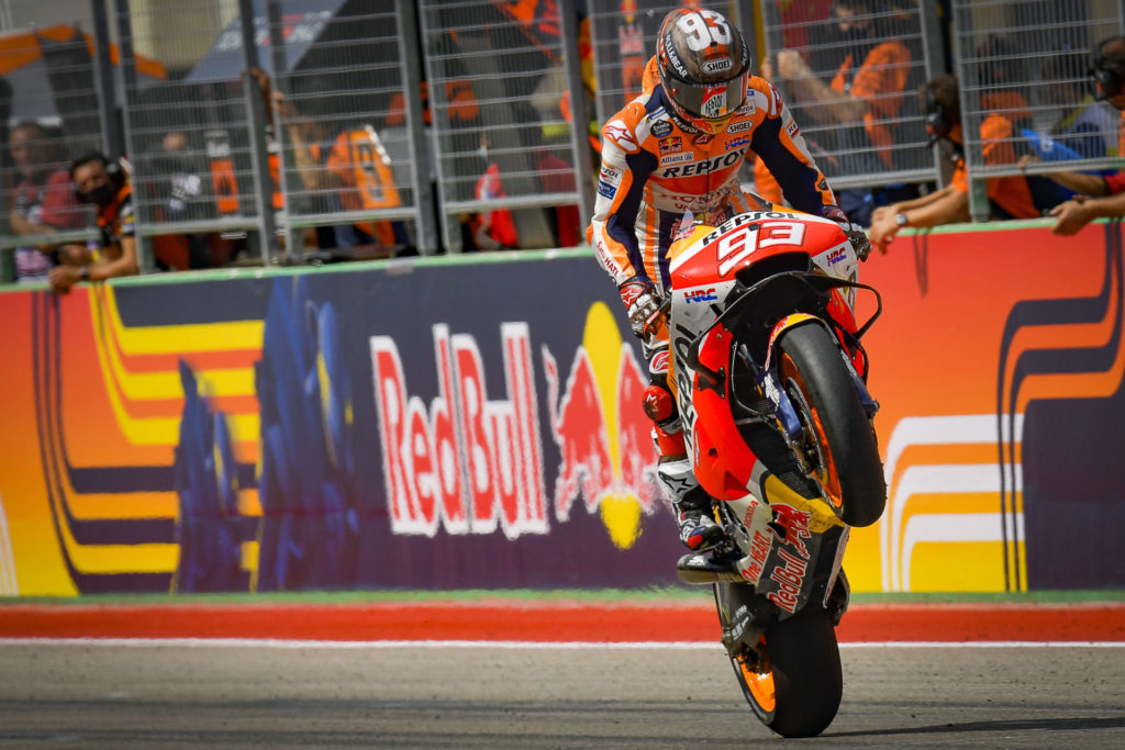 Marc Marquez (93) celebrates with a wheelie across the finish line at COTA. Photo courtesy Dorna.