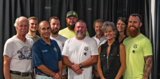(From left) Jim Doyle (AHRMA Business Develpoment Manager), Andrew Berkley (UTR Team), Arthur Kowitz (AHRMA Chairman of the Board), Arch E. York (UTR Team), Shane Quigg (UTR Team), Arch A. York (UTR Team Owner), Curt Comer (AHRMA Executive Director), Amy Jaques (AHRMA Sales), Dewanna Comer, and Tommy Ryan (UTR Team). Photo by Stephanie Vetterly Photography, courtesy AHRMA.