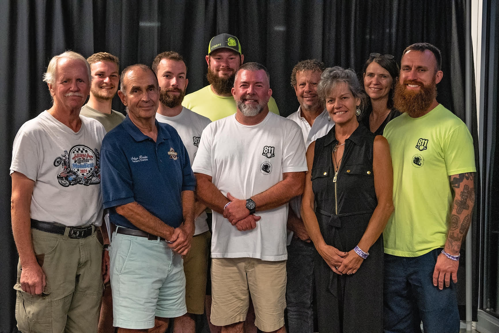 (From left) Jim Doyle (AHRMA Business Develpoment Manager), Andrew Berkley (UTR Team), Arthur Kowitz (AHRMA Chairman of the Board), Arch E. York (UTR Team), Shane Quigg (UTR Team), Arch A. York (UTR Team Owner), Curt Comer (AHRMA Executive Director), Amy Jaques (AHRMA Sales), Dewanna Comer, and Tommy Ryan (UTR Team). Photo by Stephanie Vetterly Photography, courtesy AHRMA.