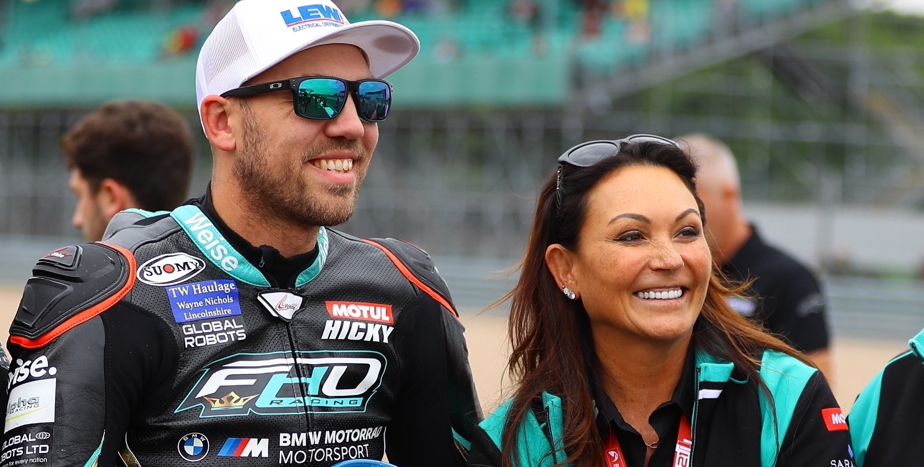 Peter Hickman (left) with FHO Racing BMW owner Faye Ho. Photo courtesy FHO Racing BMW.