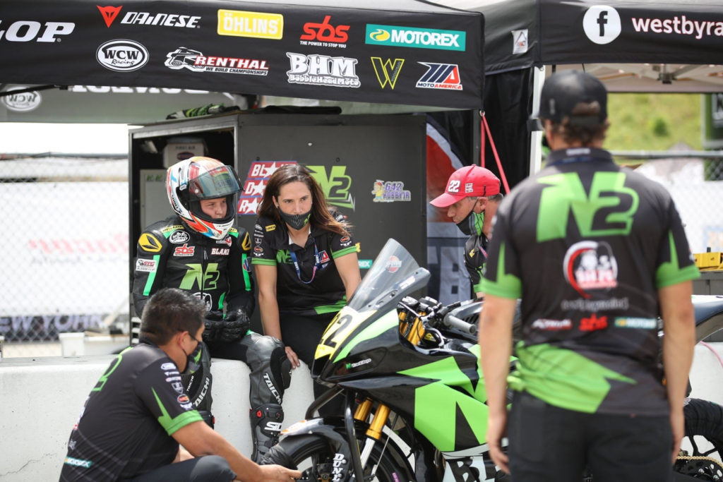 N2 Racing Team Manager Shiloh Salopek seated next to Junior Cup rider Blake Davis. Photo by Brian J. Nelson.