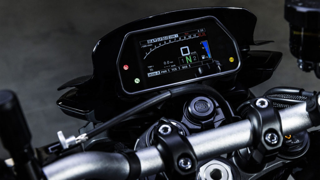 The 2022-model Yamaha MT-10 comes with a full-color dashboard and a conveniently located power outlet. Photo courtesy Yamaha Motor Europe.