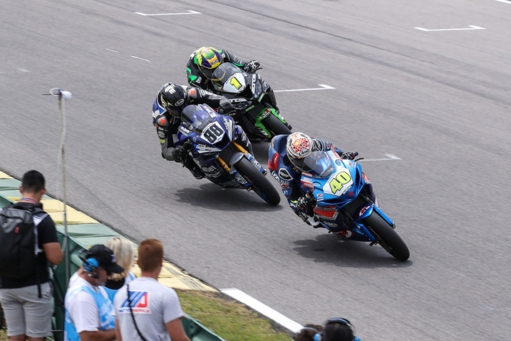 Benjamin Smith (88) fights for the lead with Sean Dylan Kelly (40) and Richie Escalante (1) during Supersport Race One at VIRginia International Raceway in 2021. Photo by Brian J. Nelson.