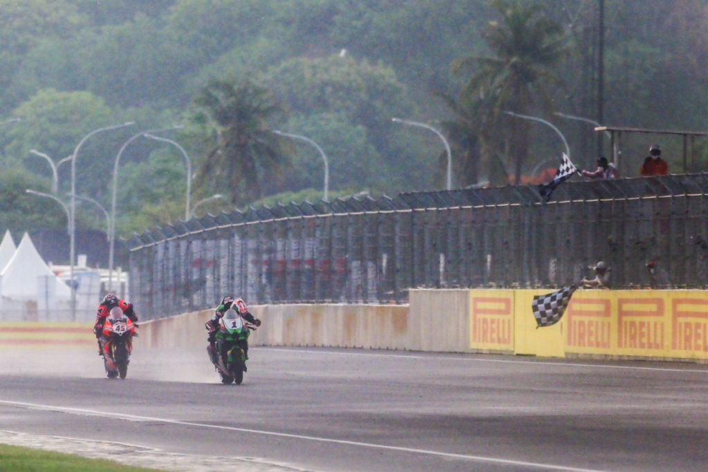 Jonathan Rea (1) beats Scott Redding (45) to the checkered flag in Indonesia. Photo courtesy Dorna.