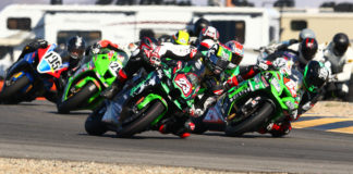 Corey Alexander (23), Andy DiBrino (62), and Michael Gilbert (behind Alexander) battle for the lead at the start of the CVMA Open Shootout race at Chuckwalla Valley Raceway. Photo by CaliPhotography.com, courtesy CVMA.