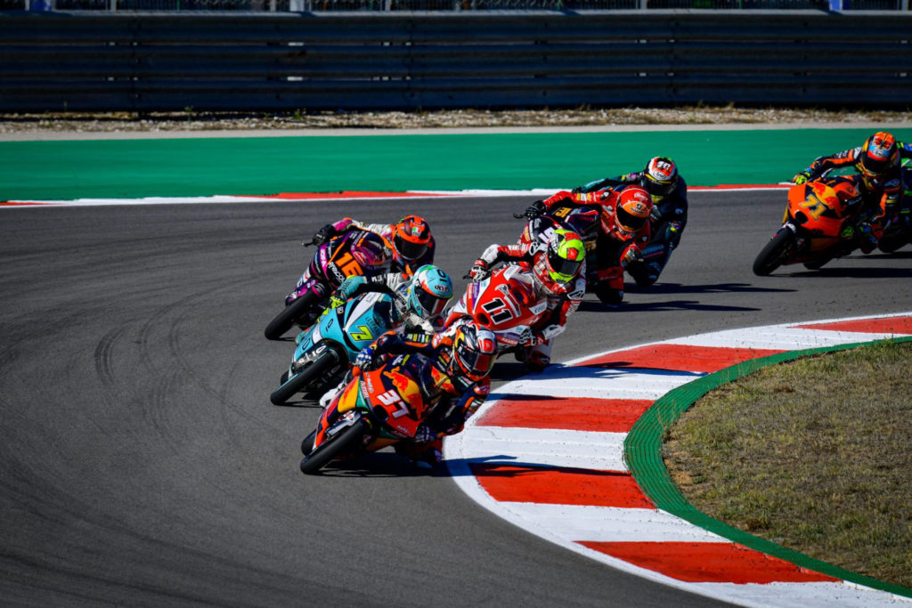 Pedro Acosta (37) leads a group of riders at Algarve International Circuit. Photo courtesy Dorna.