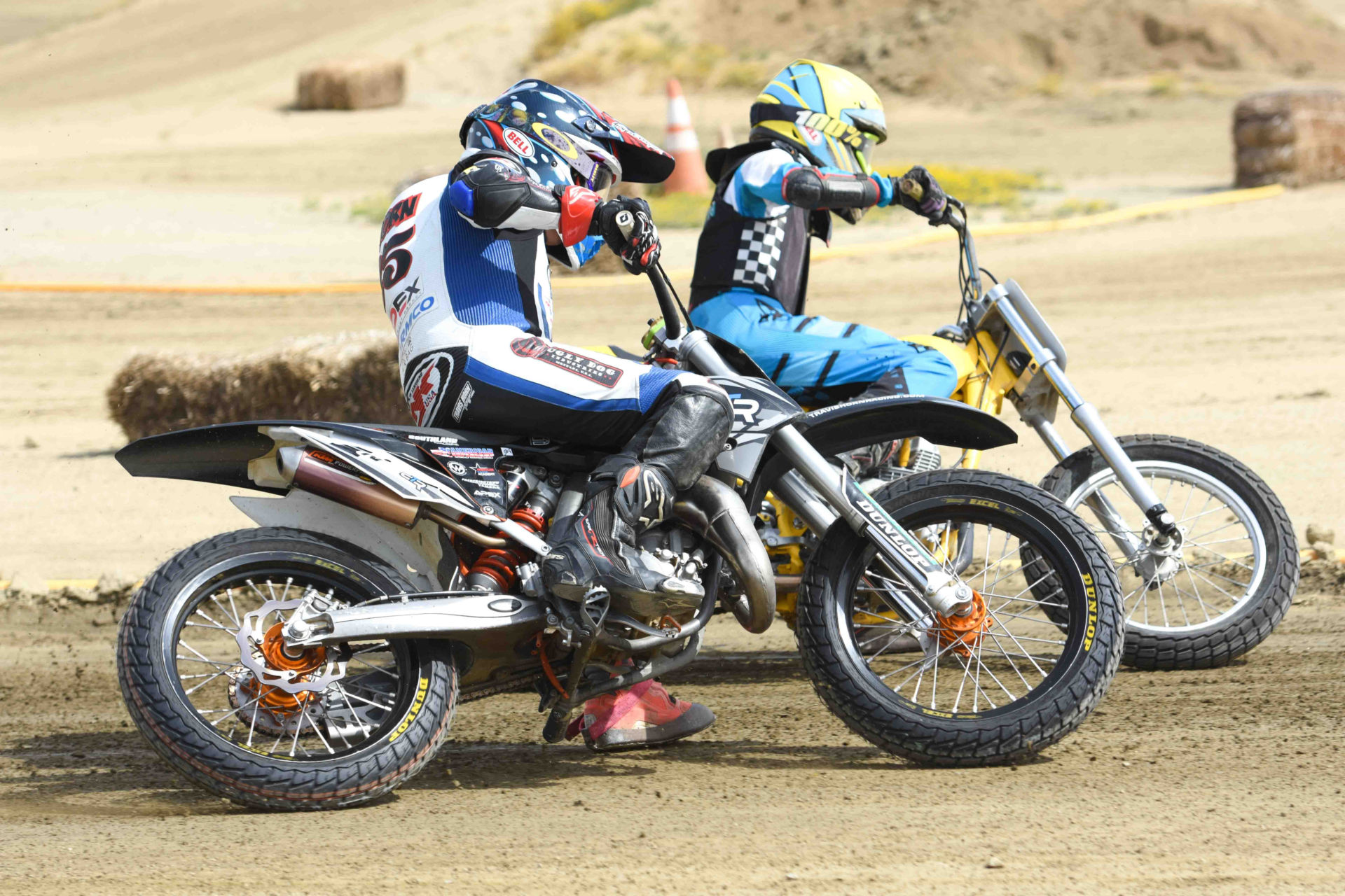 Racer Travis Horn (foreground) at speed on a set of Dunlop DT4 dirt track tires. Photo by DW Media, courtesy Dunlop.