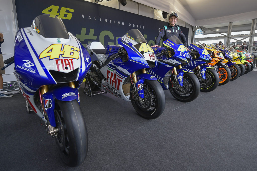 Valentino Rossi with his nine World Championship-winning racebikes. Photo courtesy Dorna.