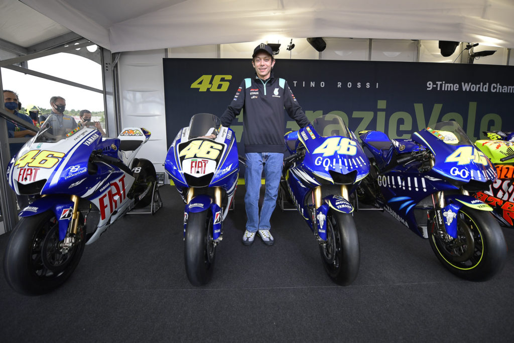 Valentino Rossi with his title-winning Yamaha YZR-M1 racebikes. Photo courtesy Dorna.